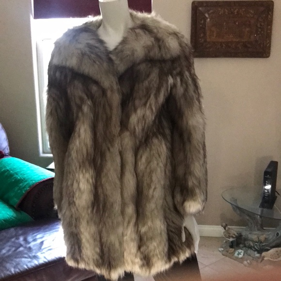 Real Fox Fair med length Coat purchased in Paris airport decade ago for $10k.
